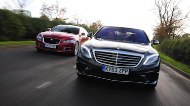 Mercedes S63 AMG vs Jaguar XJR main