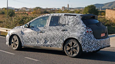 Nissan VW Golf rival side