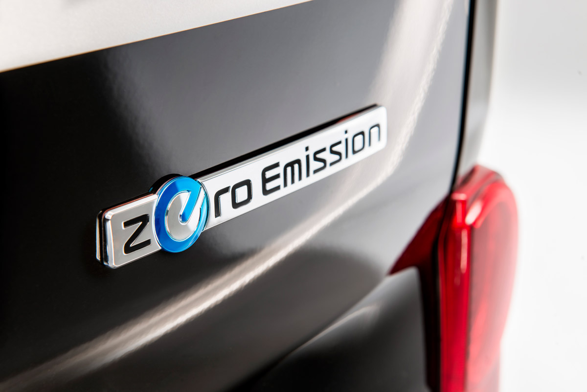 Nissan electric taxi 2015 badge