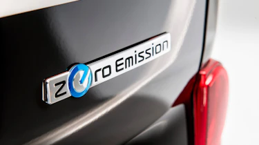 Nissan electric taxi 2015 badge