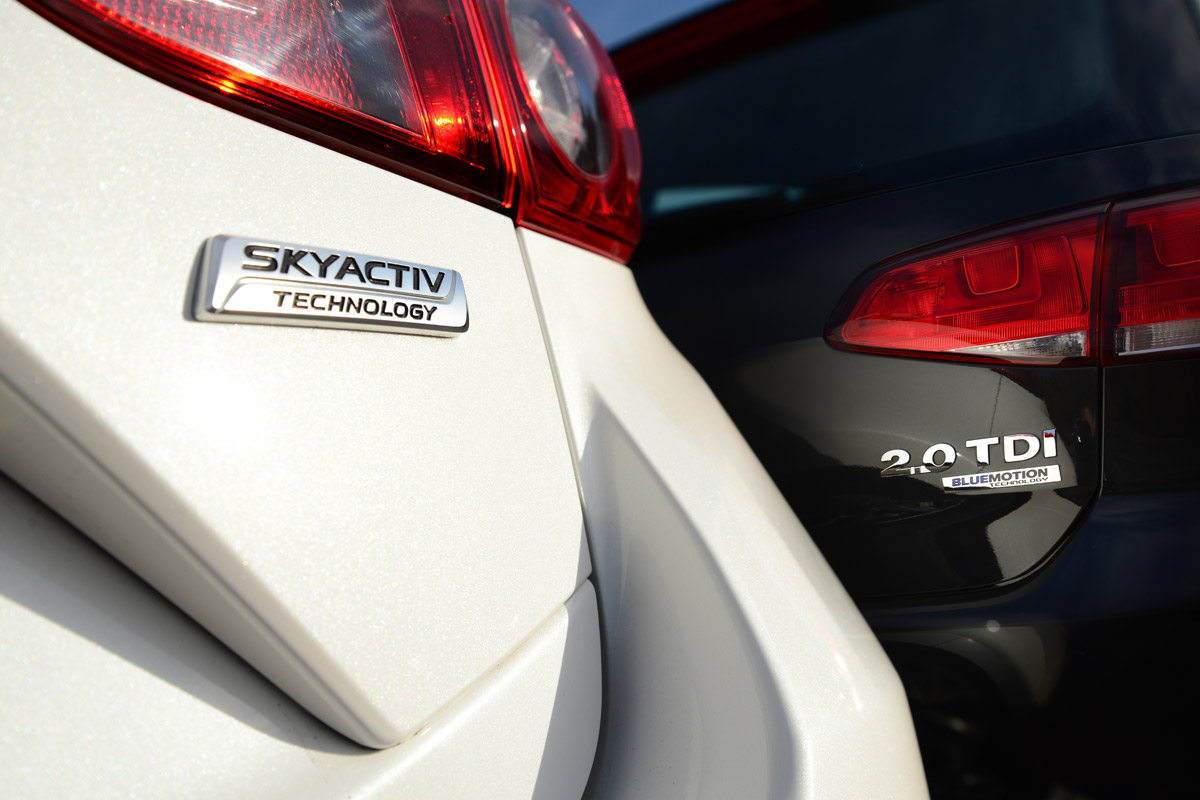 Volkswagen Golf vs Mazda 3 badges