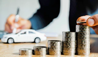 Coin pile and model car